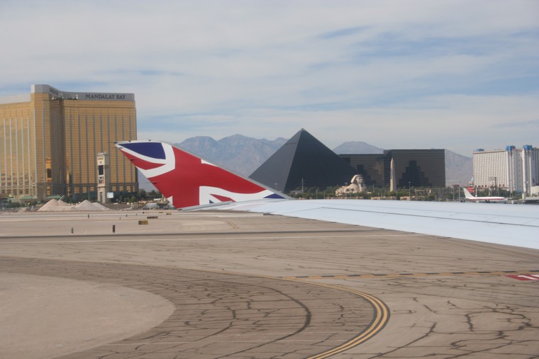 Las Vegas Airport. Luxor Hotel in background center.