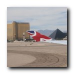 Las Vegas Airport. Luxor Hotel in background center.